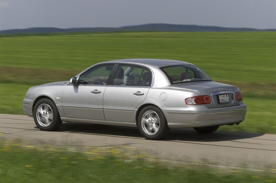  Kia Opirus 2003 года  (фото 16 из 54)